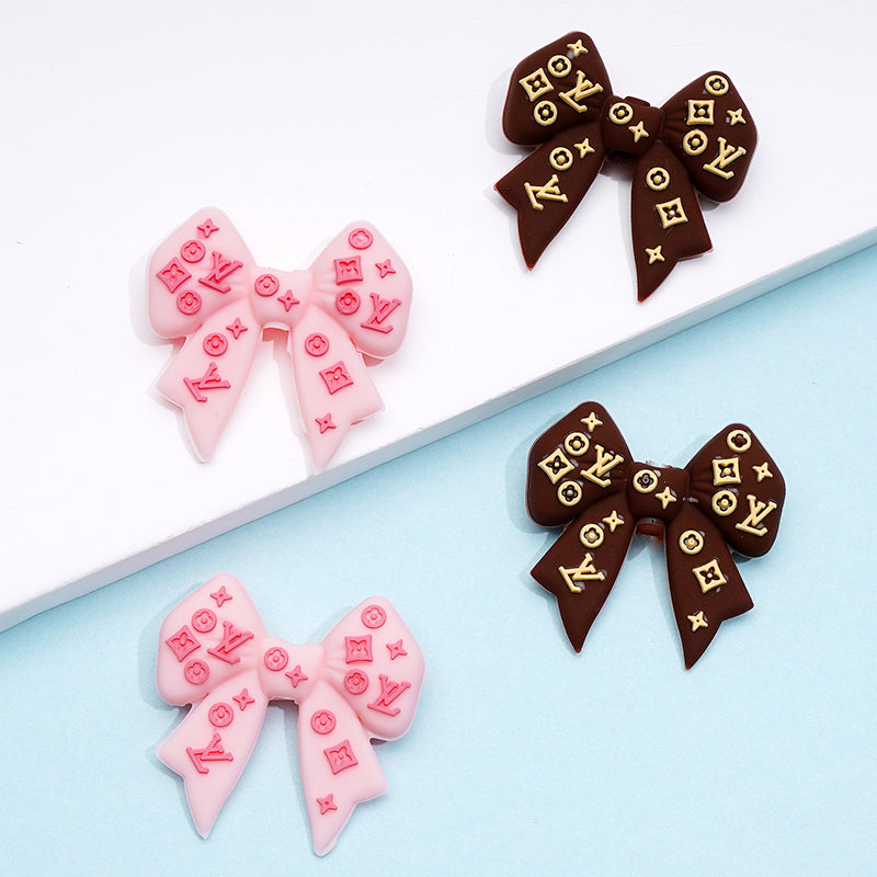 VL Bow Brown Pink Silicone Focal Beads
