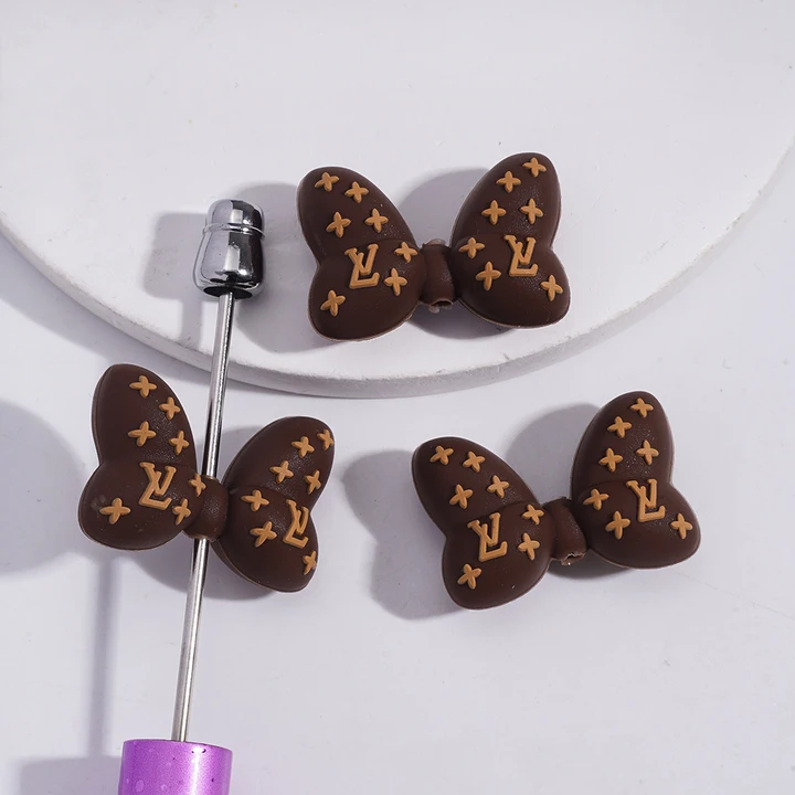 CC Patterned Coffee-Colored Bow Focal Beads,HY