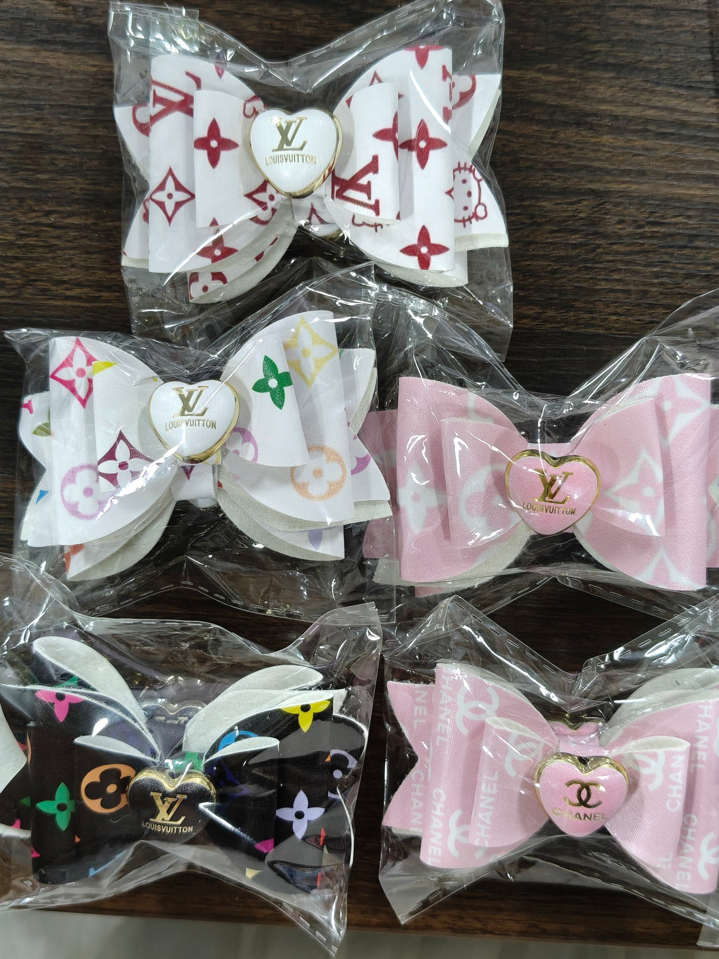 Leather VL Large Bow Classic Pattern, Pink, White, And Black, Two Per Bag. The Hole Is On The Bead. Please Note That The Back Is White.